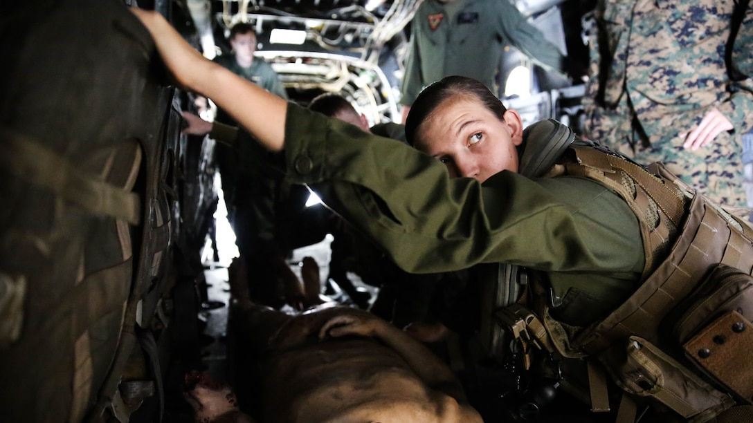 Lance Cpl. Amanda Bowden practices properly loading a casualty onto an aircraft during an evacuation scenario at Marine Corps Base Camp Pendleton, Jan. 27, 2016. This training was part of the newly formed combat operation medical emergency transport training. COMETT exposes the aircrew to medical emergencies and procedures they may encounter in combat and non-combat environments. Bowden is an ordnance technician with Marine Aircraft Group 29. 