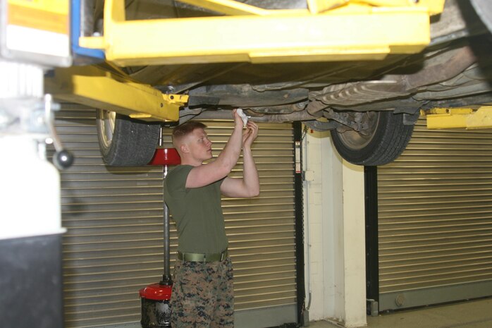 2nd Lt. Dylan Riedell works on his car's differentials at the Auto Skills Center aboard Marine Corps Base Quantico Jan. 21.