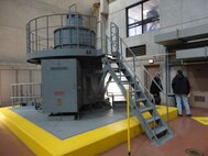 An EEAP auditor interviews the operator of a large electric pump motor for an energy audit at Lake Chicot Pumping Station. EEAP audits include working side-by-side with the customer to get a thorough understanding of the customers needs and requirements.