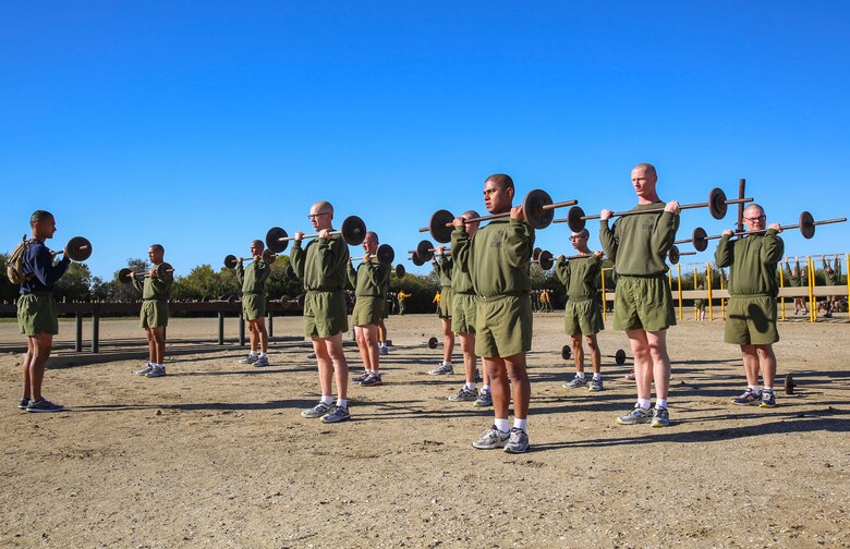 Recruits of Mike Company, 3rd Recruit Training Battalion, lift weights during the circuit course event at Marine Corps Recruit Depot San Diego, Feb. 2. Many of the exercises required the use of the recruits’ upper body strength. Annually, more than 17,000 males recruited from the Western Recruiting Region are trained at MCRD San Diego. Mike Company is scheduled to graduate April 15.
 
