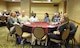 Air Force Reserve couples listen during the Yellow Ribbon Reintegration Program's initial Couples Enrichment Program class Jan. 30, 2015, in Denver. Unlike most courses offered during Yellow Ribbon, this training encompasses the entire weekend and encourages couples to focus on improving their relationships in a positive and productive manner. Chaplain (Maj.) Joshua Kim of the 459th Air Refueling Wing, Joint Base Andrews, Maryland, led the instruction. (U.S. Air Force photo by Master Sgt. Megan Crusher) 