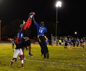 Receivers and defenders battle for a pass during a flag football playoff semifinals game at Barksdale Air Force Base, La., Jan. 27, 2016. The flag football regular season concluded after three months of action in which each team played 10 games. The top eight teams made the post season in an eight-team single-elimination playoff. (U.S. Air Force photo/Airman 1st Class Curt Beach)