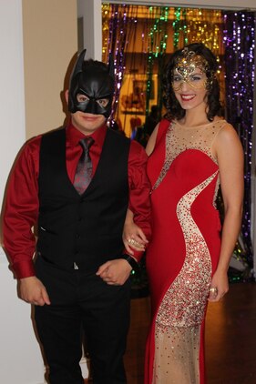 Lance Cpl. Steven Smith, Casualty Branch, and Lance Cpl. Jessica Arnold, Funeral Honors, at the Mardia Gras Masquerade Ball on Jan. 29.