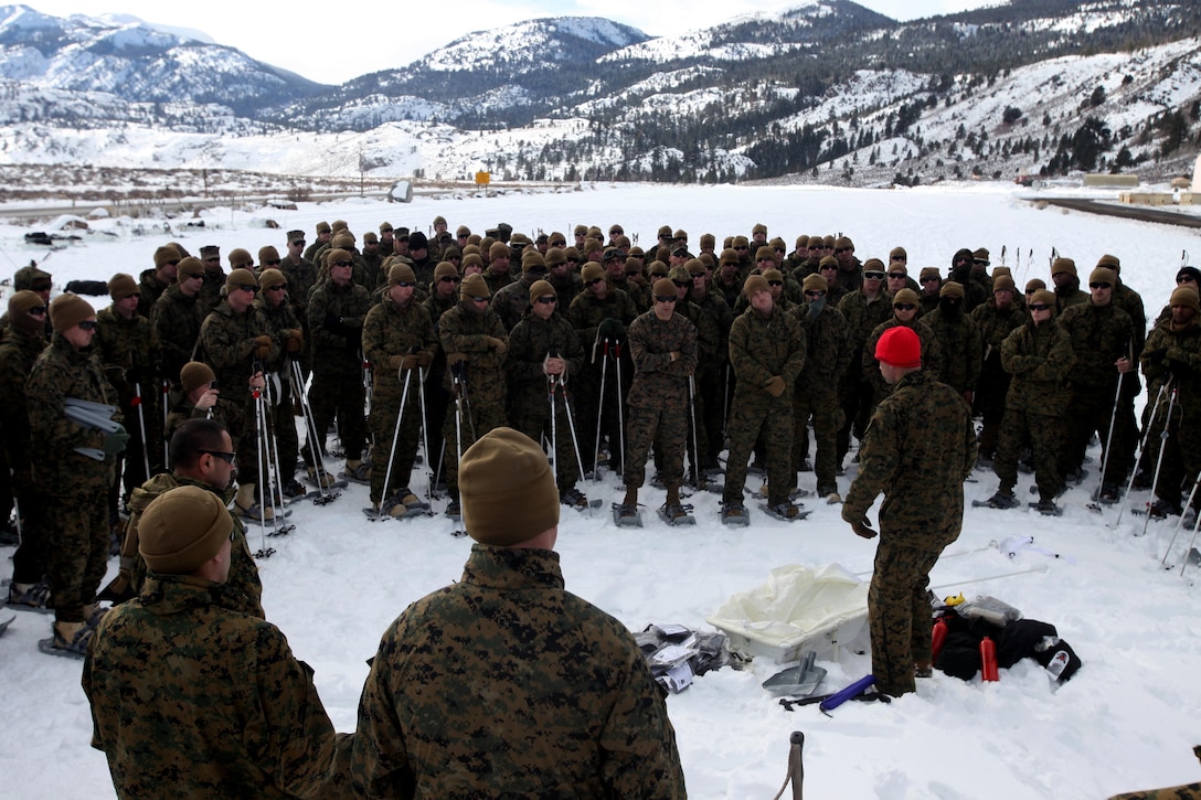 An instructor teaches Marines how to properly use a sled and sled equipment during cold weather training at Marine Corps Mountain Warfare Training Center, Calif., Jan. 21, 2016. The cold weather training done in the Sierra Mountains is a warm-up to Exercise Cold Response 1-16 in Norway. Nearly 80 Marines with 2nd LAAD Bn. participated in the two-weeklong exercise that taught basic mobility in snow, defensive and offensive tactics as well as basic cold weather and high altitude conditions training.
