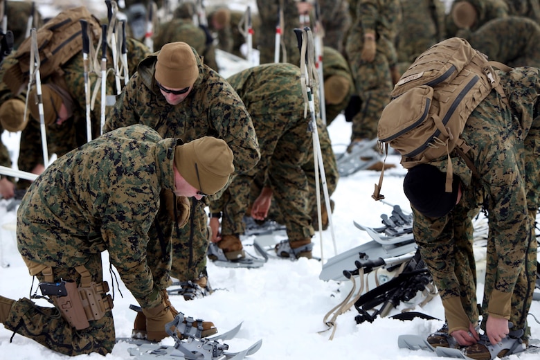 Marines put on snowshoes for the first time during cold weather training at Marine Corps Mountain Warfare Training Center, Calif., Jan. 21, 2016. The cold weather training done in the Sierra Mountains is a warm-up to Exercise Cold Response 1-16 in Norway. Nearly 80 Marines with 2nd LAAD Bn. participated in the two-weeklong exercise that taught basic mobility in snow, defensive and offensive tactics as well as basic cold weather and high altitude conditions training.