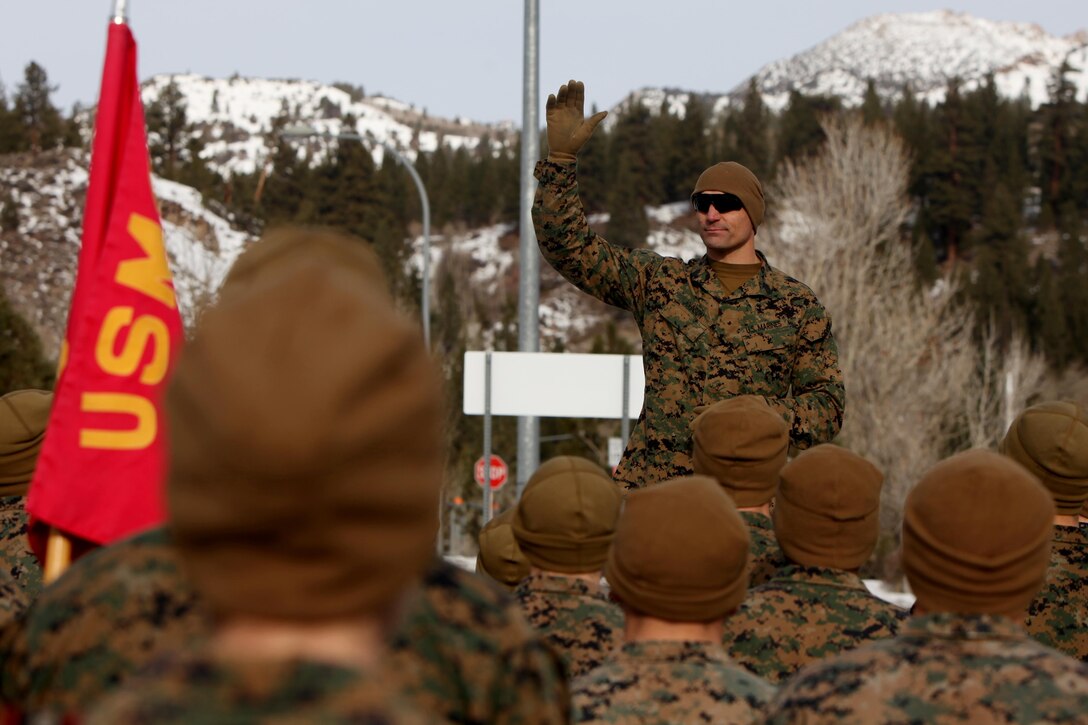 Master Sgt. Donald Johnson greets 2nd Low Altitude Air Defense Battalion Marines during cold weather training at Marine Corps Mountain Warfare Training Center, Calif., Jan. 21, 2016. The cold weather training done in the Sierra Mountains is a warm-up to Exercise Cold Response 1-16 in Norway. Nearly 80 Marines with 2nd LAAD Bn. participated in the two-weeklong exercise that taught basic mobility in snow, defensive and offensive tactics as well as basic cold weather and high altitude conditions training. Johnson is the operations chief with 2nd LAAD Bn.