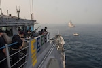 VISAKHAPATNAM, India (Feb. 4, 2016) The Ticonderoga-class guided-missile cruiser USS Antietam (CG 54) anchors next to the the Arleigh Burke-class guided-missile destroyer USS McCampbell (DDG 85) during India’s International Fleet Review (IFR) 2016. IFR 2016 is an international military exercise hosted by the Indian Navy to help enhance mutual trust and confidence with navies from around the world. Antietam and McCampbell, forward deployed to Yokosuka, Japan, are on patrol in the 7th Fleet area of operations in support of security and stability in the Indo-Asia-Pacific. 