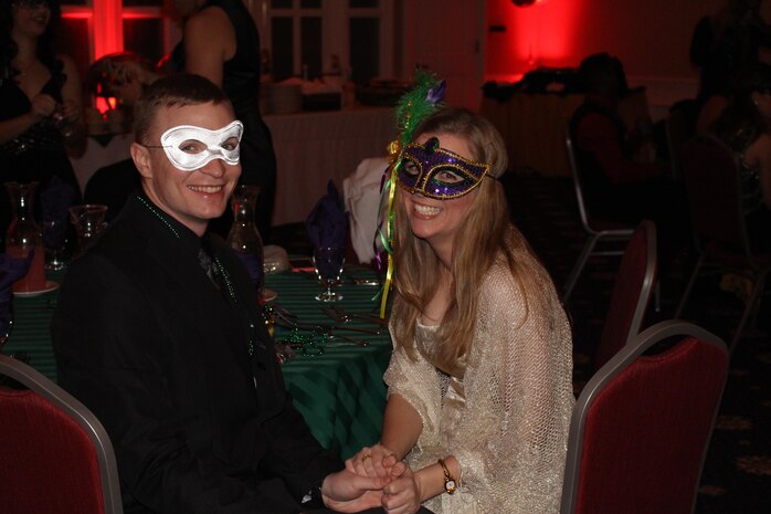 Sgt. William Doherty, Manpower Management Reserve Affairs, and his date Bonnie Hennessee at the Mardi Gras Masquerade Ball Jan. 29.