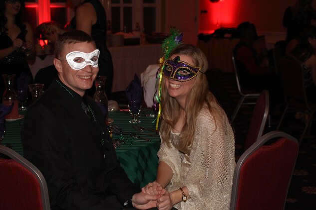 Sgt. William Doherty, Manpower Management Reserve Affairs, and his date Bonnie Hennessee at the Mardi Gras Masquerade Ball Jan. 29.