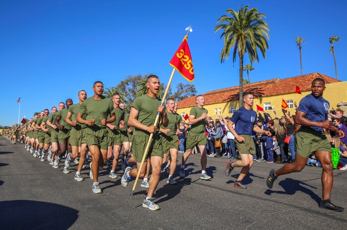 Marines of Lima Company, 3rd Recruit Training Battalion, run in formation during their motivation run at Marine Corps Recruit Depot San Diego, Feb. 4. After the Marines complete the run, they spend the rest of the afternoon with their families, friends and loved ones during on-base liberty. Annually, more than 17,000 males recruited from the Western Recruiting Region are trained at MCRD San Diego. Lima Company is scheduled to graduate Feb. 5.