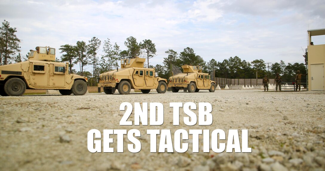 A vehicle convoy, operated by Marines with 2nd Transportation Support Battalion, prepares to exit the simulated Forward Operating Base Greater Sandy Runs Area to conduct counter-improvised explosive device training during a tactical operations package with Battle Skills Training School, 2nd Marine Logistics Group, at Camp Lejeune, N.C., Feb. 3, 2016. The course is conducted to refresh Marines from non-infantry military occupational specialties on infantry-related skills and tactics in a five-week span. (U.S. Marine Corps photo illustration by Cpl. Joey Mendez/Released)