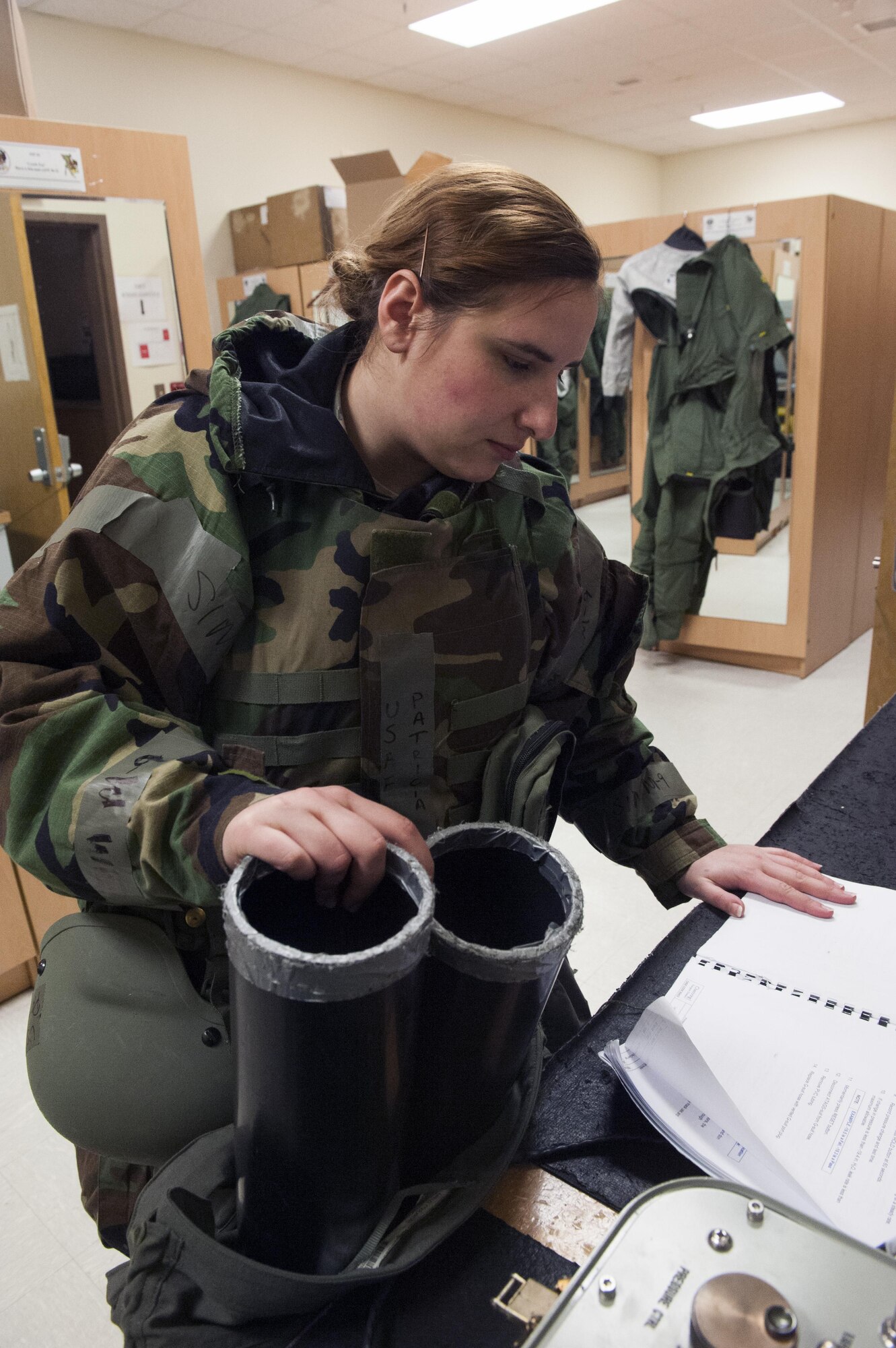 Staff Sgt. Patricia Johnson, 8th Operation Support Squadron aircrew flight equipment journeyman, tests an F-16 Fighting Falcon pilot’s G-suit during Beverly Pack 16-2 at Kunsan Air Base, Republic of Korea, Feb. 4, 2015. Though the exercise was planned for months, Airmen were not told when it would start, testing their readiness and ability to respond to a crisis at a moment's notice. (U.S. Air Force photo by Staff Sgt. Nick Wilson/Released)