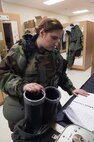 Staff Sgt. Patricia Johnson, 8th Operation Support Squadron aircrew flight equipment journeyman, tests an F-16 Fighting Falcon pilot’s G-suit during Beverly Pack 16-2 at Kunsan Air Base, Republic of Korea, Feb. 4, 2015. Though the exercise was planned for months, Airmen were not told when it would start, testing their readiness and ability to respond to a crisis at a moment's notice. (U.S. Air Force photo by Staff Sgt. Nick Wilson/Released)