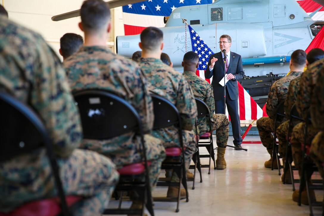 Secretary of Defense Ashton Carter talks to troops during his visit aboard Marine Corps Air Station Miramar, Calif., Feb. 3. During his time aboard station, he toured aircraft and answered questions from Marines. (U.S. Marine Corps photo by Cpl. Alissa P. Schuning/Released)