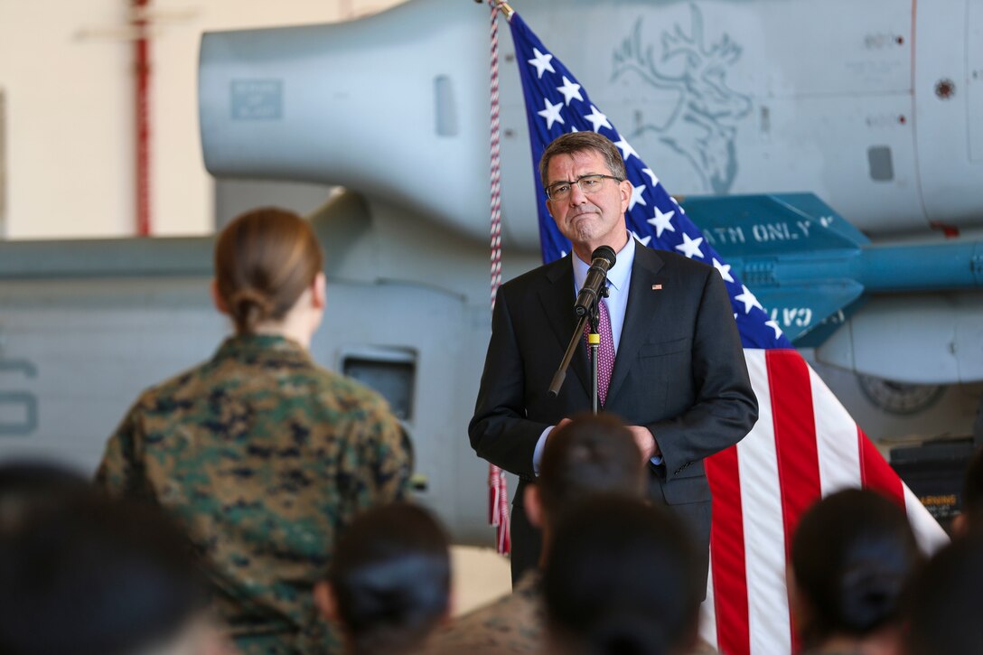 Secretary of Defense Ashton Carter answers questions from Marines during his visit aboard Marine Corps Air Station Miramar, Calif., Feb. 3. During his time aboard station, he also conducted a troop talk and handed out challenge coins. (U.S. Marine Corps photo by Cpl. Alissa P. Schuning/Released)