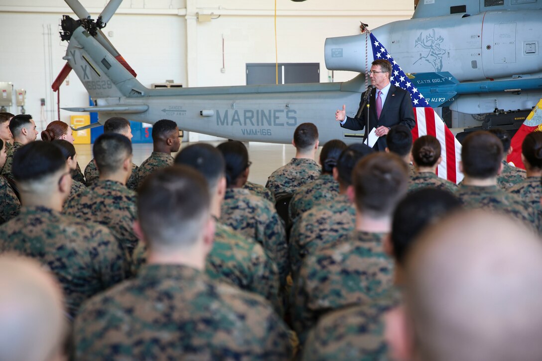 Secretary of Defense Ashton Carter talks to troops during his visit aboard Marine Corps Air Station Miramar, Calif., Feb. 3. During his time aboard station, he toured aircraft and answered questions from Marines. (U.S. Marine Corps photo by Cpl. Alissa P. Schuning/Released)