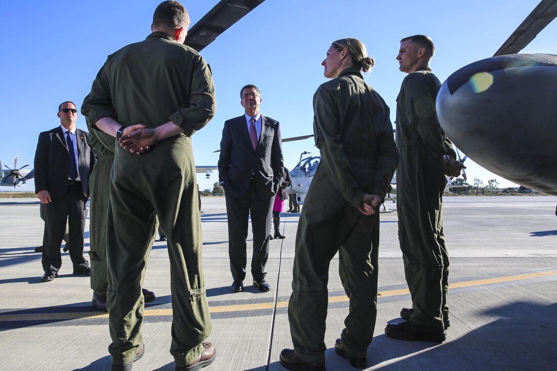 Secretary of Defense Ashton Carter talks to Marines while touring aircraft during his visit aboard Marine Corps Air Station Miramar, Calif., Feb. 3. During his time aboard station, he also conducted a troop talk and answered questions from Marines. (U.S. Marine Corps photo by Cpl. Alissa P. Schuning/Released)