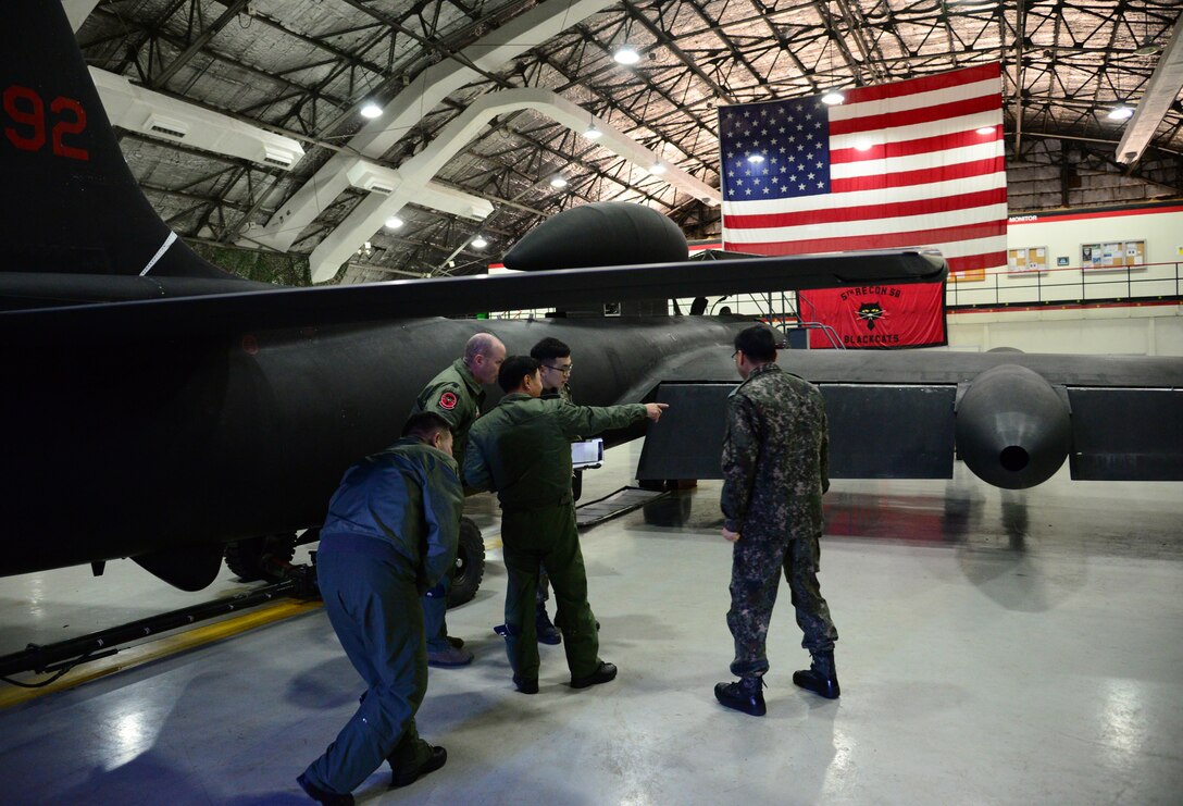 Maj. Gen. Choi, Geyn Young, Republic of Korea air force Air Mobility Reconnaissance Command commander, is briefed on the mission and capabilities of the U-2 Dragon Lady during his immersion tour at Osan Air Base, ROK, Feb. 1, 2016. Choi also visited the 36th and 25th Fighter Squadrons to get an up close look at the F-16 Fighting Falcon and A-10 Thunderbolt II. (U.S. Air Force photo by Staff Sgt. Amber Grimm/Released)