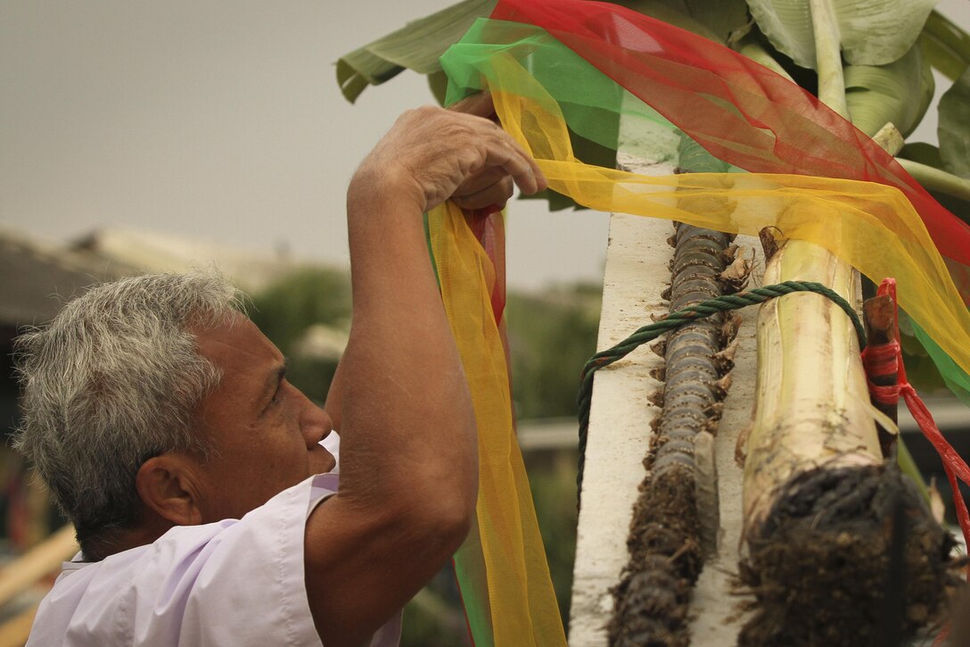 Samai Tanapai Bul blesses a construction site during a Pillar Raising Ceremony as part exercise Cobra Gold 2016 in Wuat Ban Mak, Saraburi, Thailand, Jan. 25, 2016. Cobra Gold 2016, in its 35th iteration, includes a specific focus on humanitarian civic action, community engagement, and medical activities conducted during the exercise to support the needs and humanitarian interests of civilian populations around the region.