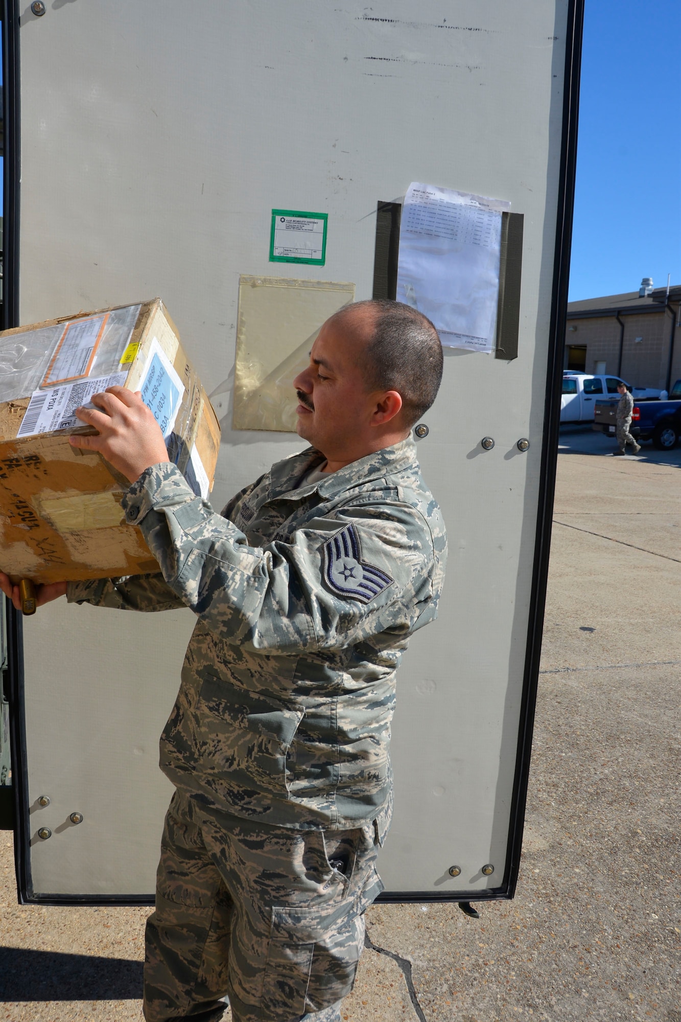 From the 142nd Fighter Wing, Portland, Oregon, Staff Sgt. Sergio Marroquin, materiel management craftsman with the 142nd Logistics Readiness Squadron, checks the data label on an aircraft part Jan. 29 at Tyndall Air Force Base. Marroquin was here to support a Combat Archer exercise with members of the 142nd Fighter Wing. Combat Archer is a two-week weapon systems evaluation program where participants load, fly and shoot live missiles and subsequently evaluate the entire process to validate whether the weapon performs according to established specifications. (Air Force Photo Released/Mary McHale)