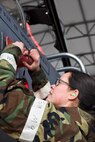 Airman 1st Class Shirley Ruiz, 4th Aircraft Maintenance Squadron avionics technician, places covers on an F-15E Strike Eagle, Feb. 1, 2016, at Seymour Johnson Air Force Base, North Carolina. Exercise Coronet Warrior 16-01 participants responded to random injects that tested their deployment skills. (U.S. Air Force photo/Airman Shawna L. Keyes)