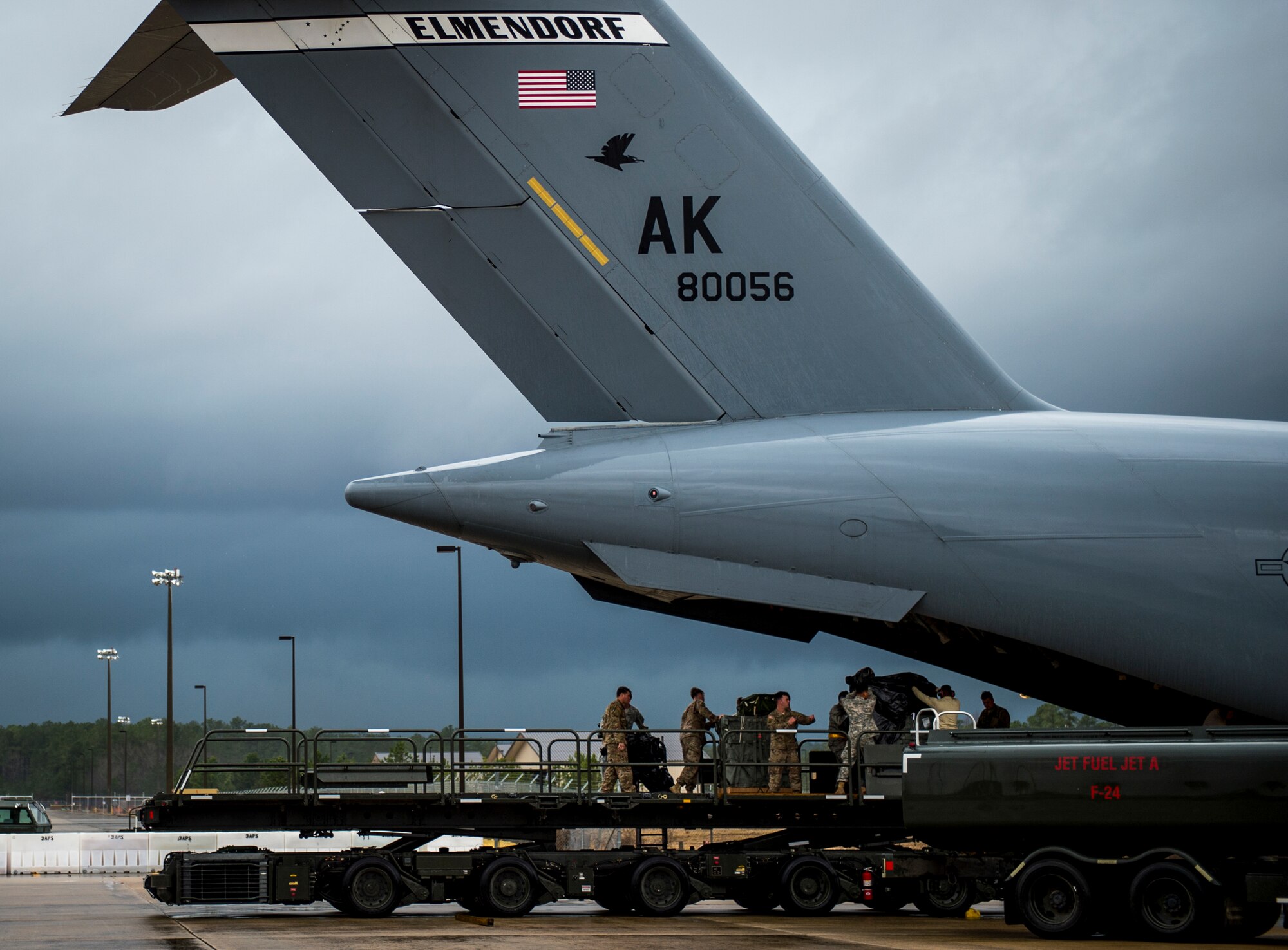 U.S. Air Force loadmasters and joint airdrop inspectors discuss inspection processes during Large Package Week at Pope Army Airfield, N.C., Feb. 3, 2016. Large Package Week leads up to Joint Access Exercise 16-5, wherein Army and Air Force units work together to improve interoperability for worldwide crisis, contingency and humanitarian operations. (U.S. Air Force photo by Staff Sgt. Marianique Santos)
