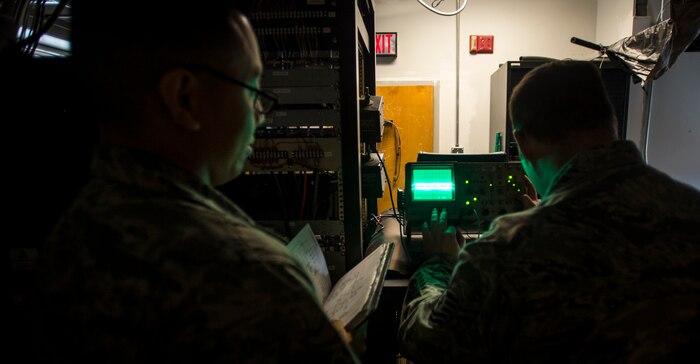 Tech. Sgt. Shawn Arnett, 437th Operations Support Squadron airfield systems technician, adjusts a radio’s frequency Jan. 27, 2016, at the command tower on Joint Base Charleston – North Auxiliary Air Field, S.C. This two-man team ensures that all of their airfield systems located at North Field work properly and provide any maintenece when needed. (U.S. Air Force photo/Senior airman Clayton Cupit)