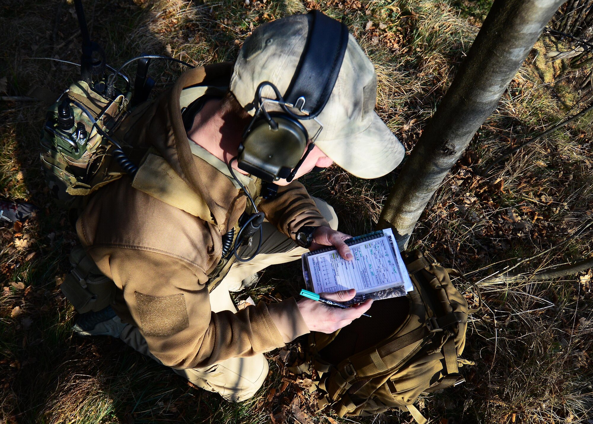 U.S. Air Force Senior Airman Tormod Lillekroken, 2nd Air Support Operations Squadron Tactical Air Control Party journeyman, plots coordinates Jan. 29, 2016, in Longarone, Italy. Pilots with the 555th Fighter Squadron and 2nd ASOS TACPs trained in surface-to-air threat scenarios in which they provided pilots with simulated enemy coordinates from austere locations. (U.S. Air Force photo by Staff Sgt. Evelyn Chavez/Released)