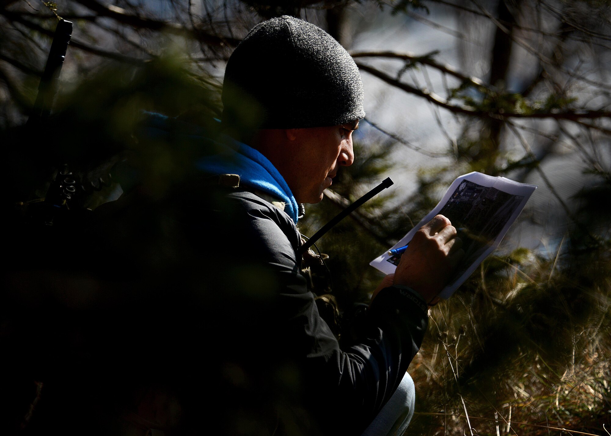 U.S. Air Force Tech. Sgt. Jason Basaldua, 2nd Air Support Operations Squadron Tactical Air Control Party instructor, checks a map for coordinates Jan. 29, 2016, in Longarone, Italy. Pilots with the 555th Fighter Squadron and 2nd ASOS TACPs trained in surface-to-air threat scenarios in which they provided pilots with simulated enemy coordinates from austere locations. (U.S. Air Force photo by Staff Sgt. Evelyn Chavez/Released)
