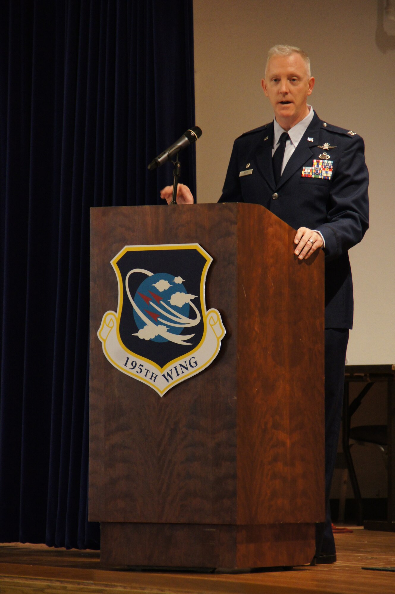 California Air National Guard 195th Wing Commander Col. Rick Hern addresses the audience during an activation ceremony for the wing at Beale Air Force Base, Calif., Nov. 7, 2015. The wing's mission is to serve as a hub for all non-flying, non-kinetic global effects operations in the California ANG, and lead the way in cyber, intelligence and space mission areas.  (California National Guard photo by Spc. Sigmund Rakiec)
