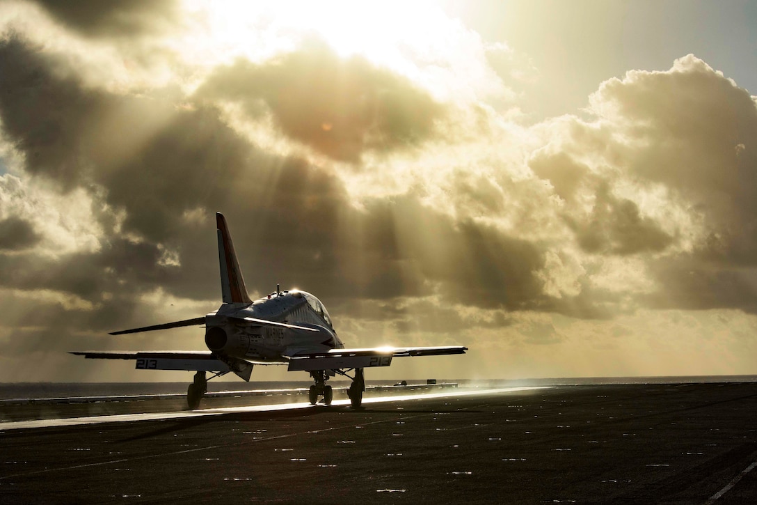 A T-45C Goshawk takes off from the flight deck of the aircraft carrier USS Dwight D. Eisenhower in the Atlantic Ocean, Feb. 3, 2015. The aircraft is assigned to Training Air Wing 2. Navy photo by Petty Officer 3rd Class J. Alexander Delgado