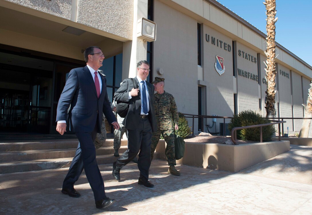 Defense Secretary Ash Carter, left, departs the Air Force Warfare Center on Nellis Air Force Base, Nev., Feb. 4, 2016. DoD photo by Navy Petty Officer 1st Class Tim D. Godbee