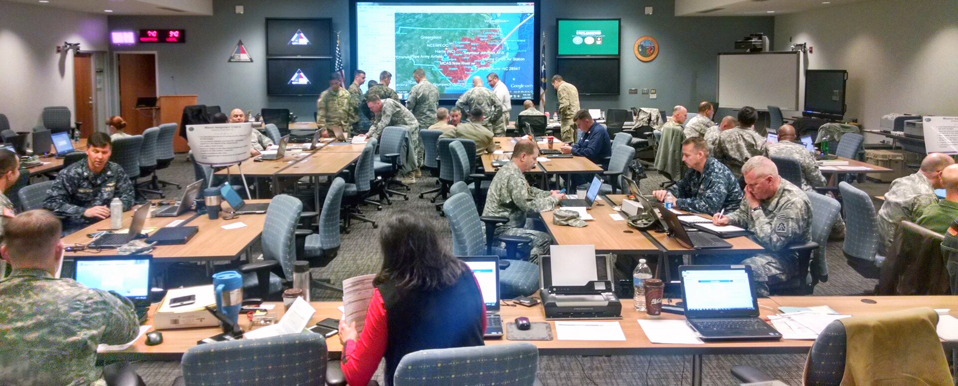 More than 50 joint military personnel that comprise the Defense Coordinating Element for Region IV work in the tactical operations
center during the Certification Exercise for Defense Coordinating Officer