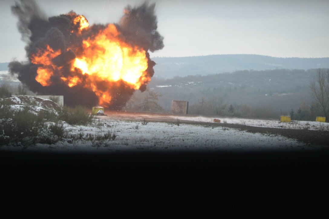 Soldiers set off an explosive charge while participating in basic and advanced explosive ordnance training at Baumholder Military Training Area, Germany, Jan. 21, 2016. Army photo by Erich Backes