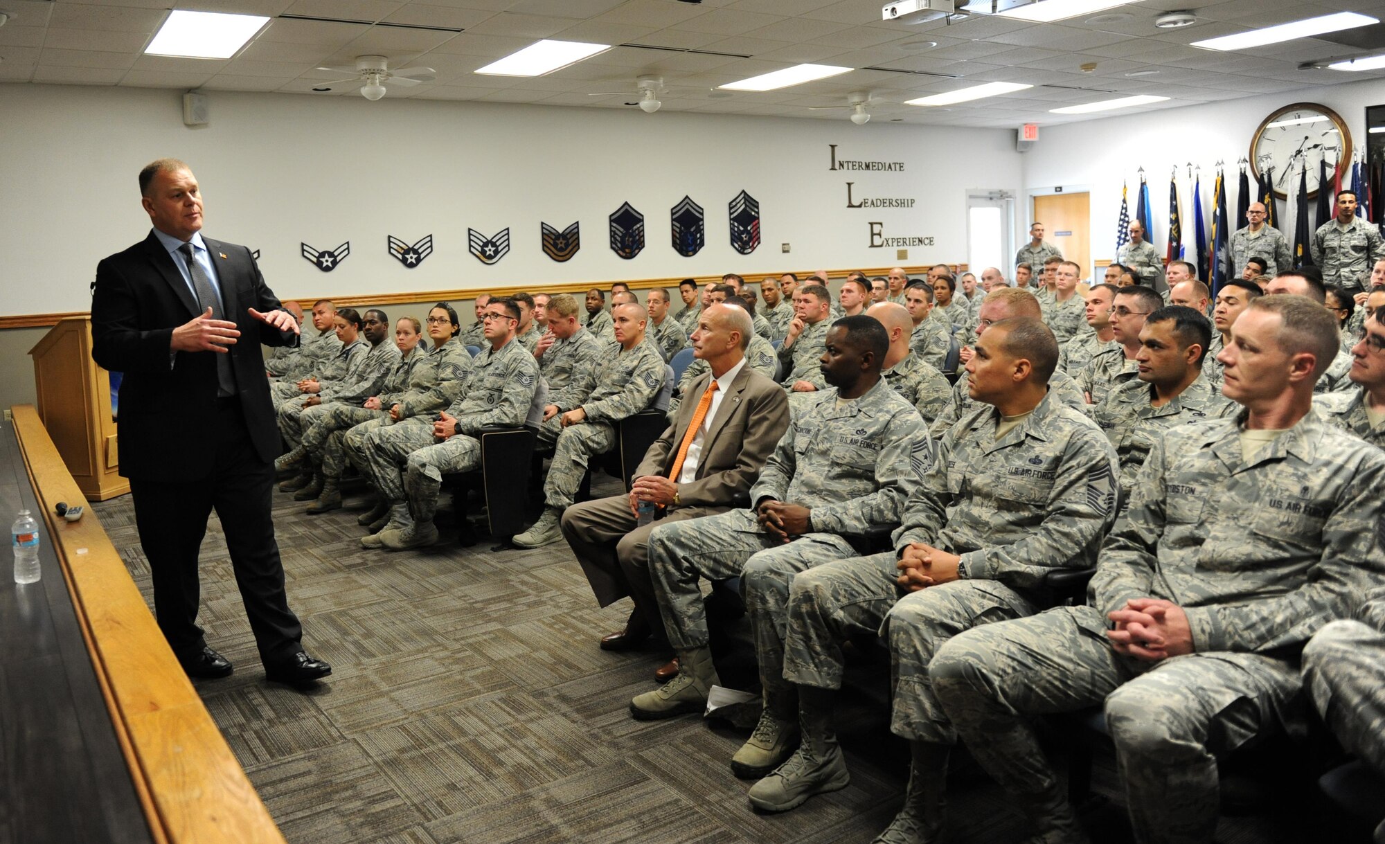James Roy, retired 16th Chief Master Sgt. of the Air Force, speaks with Keesler Honor Guard members, NCO Academy and  Airmen Leadership School students at the Mathies NCO Academy Feb. 2, 2016, Keesler Air Force Base, Miss. Roy visited Keesler to meet with Airmen in the 81st Training Wing. (U.S. Air Force photo by Kemberly Groue)