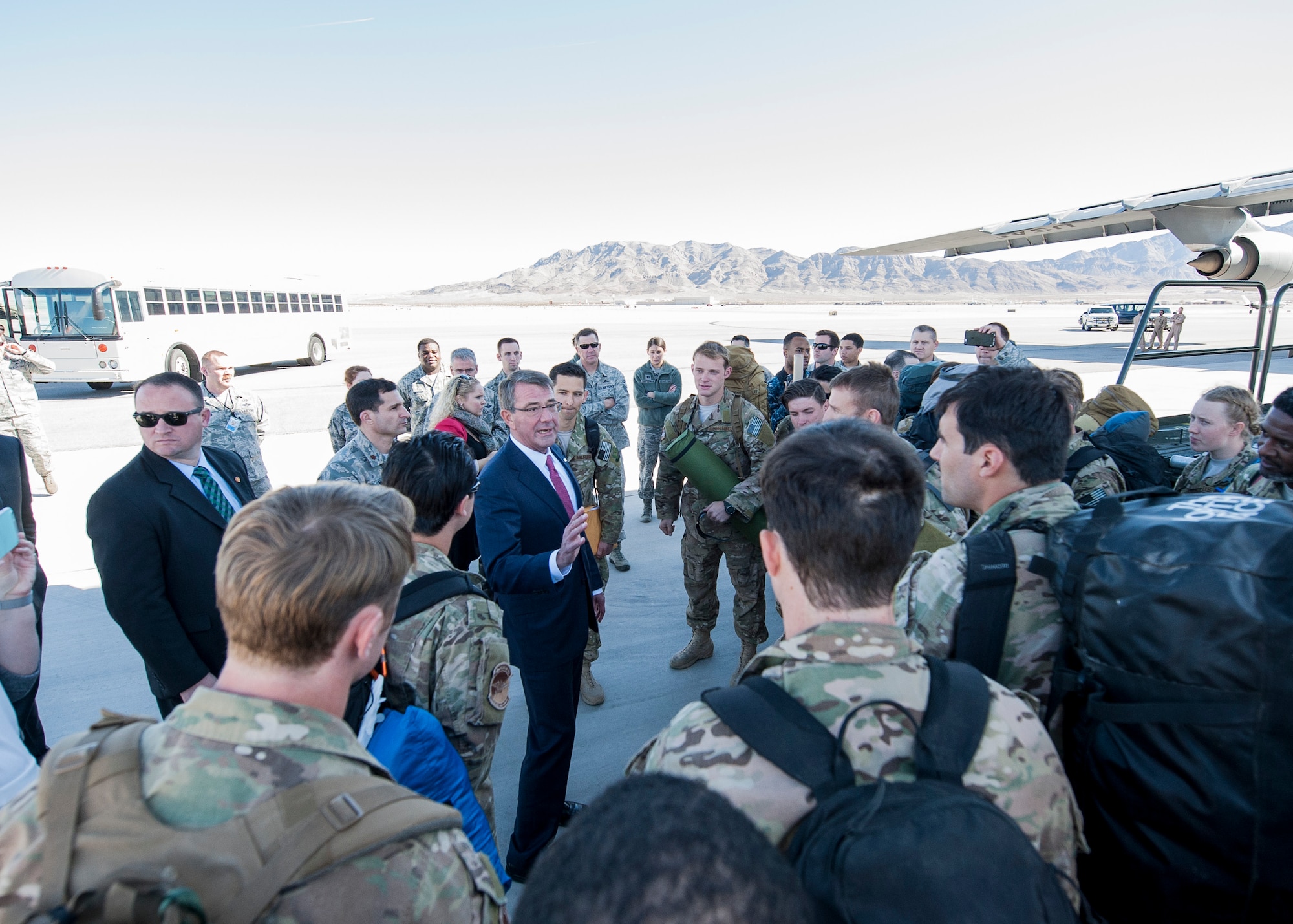 Defense Secretary Ash Carter speaks to Airmen returning from deployment at Nellis Air Force Base, Nev., Feb. 4, 2016. On his way to depart the base, Carter noticed a C-5 Galaxy where Airmen were coming off the aircraft, returning from deployment. So, he took a 20-minute detour to personally welcome home all of the returning Airmen. (U.S. Air Force photo/Staff Sgt. Siuta B. Ika)