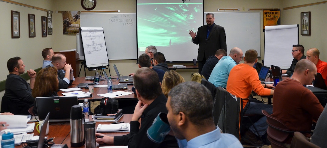 Thomas Helgeson, 88th RSC DPW deputy director and ACOE program manager, speaks at an Army Communities of Excellence Organizational Assessment Course at the 88th RSC headquarters, Fort McCoy, Wis., Feb. 1-5. , pointing out that winning an award isn't the only goal. “The point is not to win an award,” Helgeson says, “it is merely a by-product of what we are trying to achieve.” Helgeson states that everyone can effect change.  “Process improvements don’t just effect ACOE results,” Helgeson says, “they can save lives, I’ve seen it.”