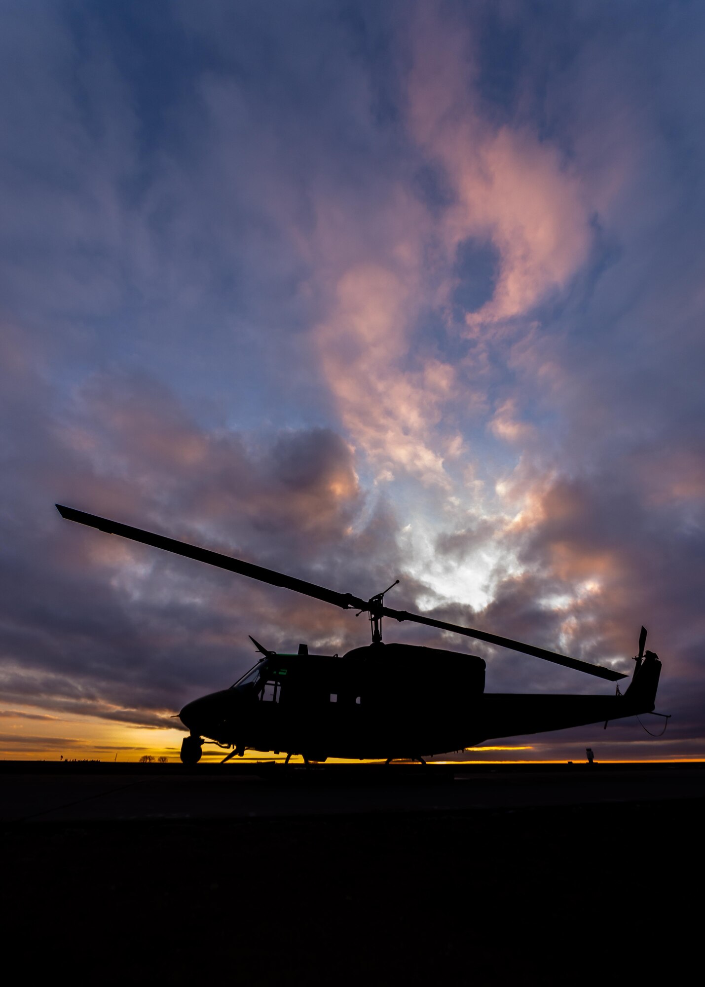 A UH-1N Iroquois from the 54th Helicopter Squadron sits on the helicopter pad at Minot Air Force Base, N.D., Feb. 2, 2016. Within Air Force Global Strike Command, the UH-1N supports the 90th Missile Wing, F.E. Warren AFB, W.Y., the 341st Missile Wing, Malmstrom AFB, M.T. and the 91st Missile Wing, Minot AFB, N.D. (U.S. Air Force photo/Airman 1st Class J.T. Armstrong)