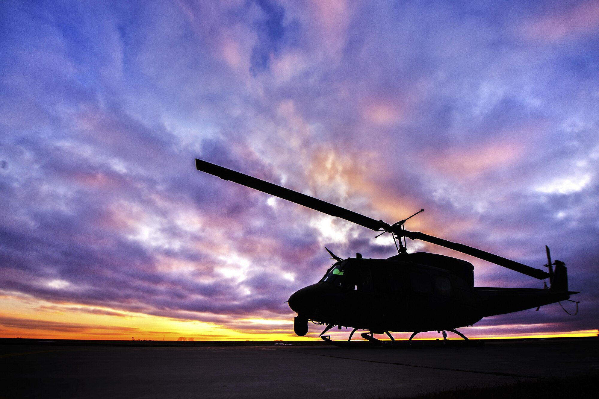 A UH-1N Iroquois from the 54th Helicopter Squadron sits on the helicopter pad at Minot Air Force Base, N.D., Feb. 2, 2016. Within Air Force Global Strike Command, the UH-1N supports the 90th Missile Wing, F.E. Warren AFB, W.Y., the 341st Missile Wing, Malmstrom AFB, M.T. and the 91st Missile Wing, Minot AFB, N.D. (U.S. Air Force photo/Airman 1st Class J.T. Armstrong)