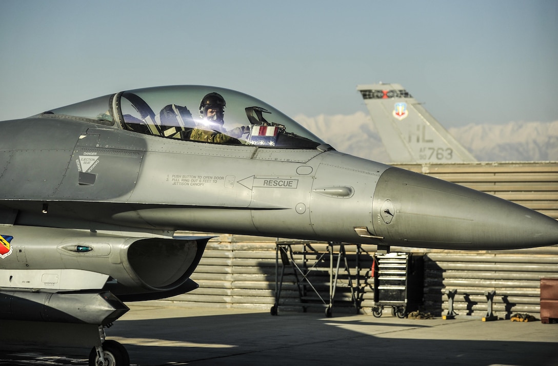 Air Force Lt. Col. Thomas Wolfe prepares to taxi after completing preflight checks on an F-16 Fighting Falcon aircraft on Bagram Airfield, Afghanistan, Feb. 1, 2016. Air Force photo by Tech. Sgt. Nicholas Rau