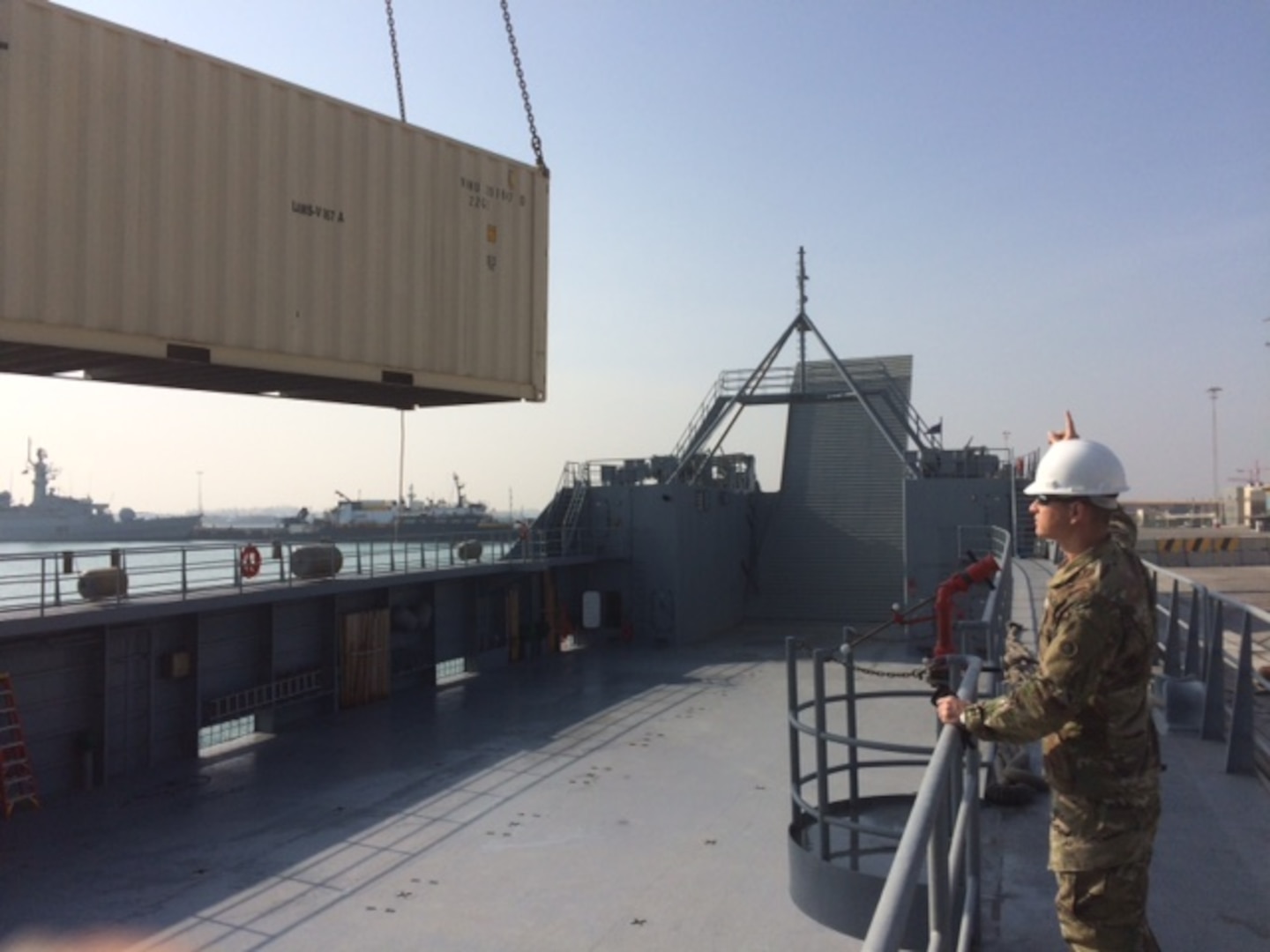 DLA Distribution Bahrain participates in the container upload for the Army Watercraft test from Mina Salman Pier Bahrain to Disposition Kuwait on Dec. 22.