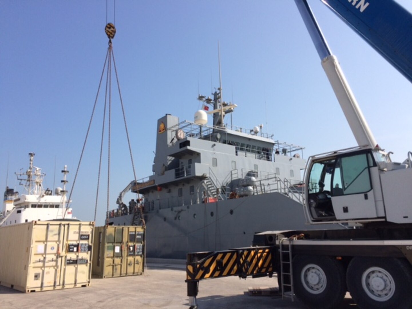 DLA Distribution Bahrain participates in the container upload for the Army Watercraft test from Mina Salman Pier Bahrain to Disposition Kuwait on Dec. 22.