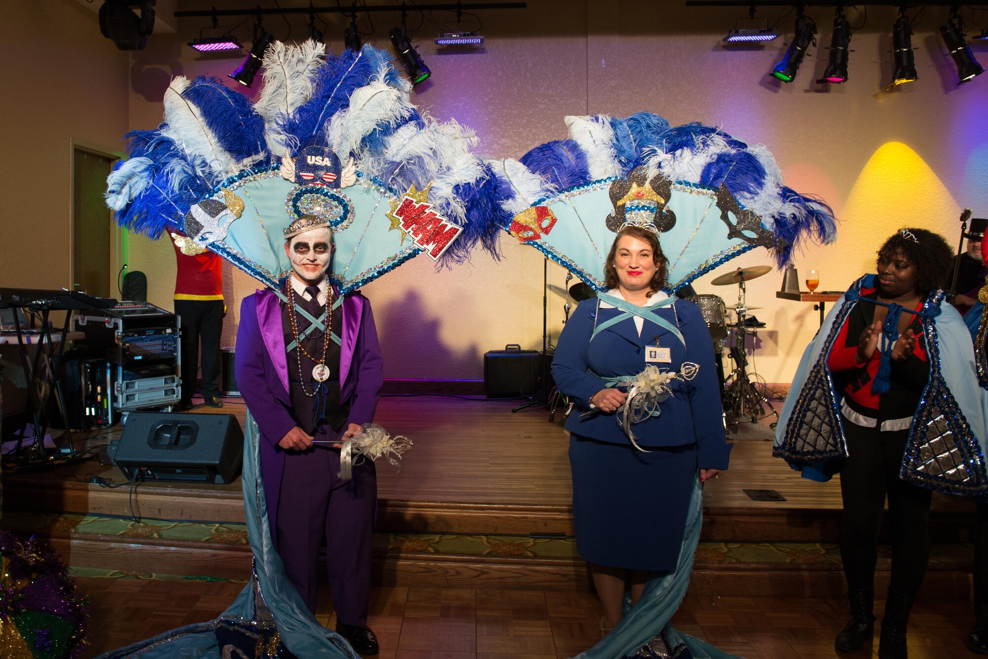 First Lt. Brandon Willis, 81st Medical Support Squadron resource management deputy flight commander, and Lindsey Dorsett, 81st MDSS release of information clerk, are crowned as the 2016 Krewe of Medics King and Queen during the 28th Annual Krewe of Medics Mardi Gras Ball at the Bay Breeze Event Center Jan. 30, 2016, Keesler Air Force Base, Miss. The Krewe of Medics hosts a yearly ball to give military personnel assigned to the Keesler Medical Center a taste of the Gulf Coast and an opportunity to experience a traditional Mardi Gras. The theme of this year's ball was superheroes and villains. (U.S. Air Force photo by Marie Floyd)