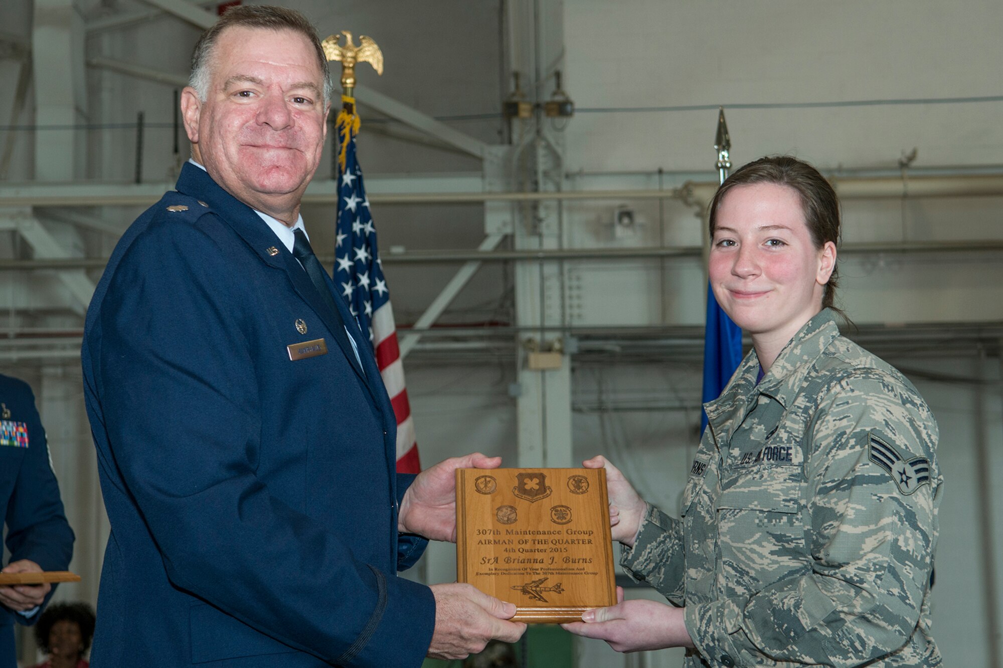 160131-F-PF761-009
U.S. Air Force Lt. Col. Leo Kamphaus, 307th Maintenance Group commander, presents an award to Senior Airman Brianna Burns during a Commander’s Call on Jan. 31, 2016, Barksdale Air Force Base, La. Burns was selected as the 307th Maintenance Squadron Airman of the Quarter for the period covering October to December 2015. (U.S. Air Force photo by Master Sgt. Greg Steele/Released)

