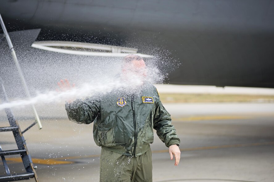 Col. Jonathan Philebaum, 512th Operations Group commander, takes his "fini-flight" at the 512th Airlift Wing, Feb. 3, 2016, at Dover Air Force Base, Del. Philebaum will be taking command of the 932nd Airlift Wing at Scott Air Force Base, Illinois, on February 7. (U.S. Air Force Photo by Capt. Bernie Kale)