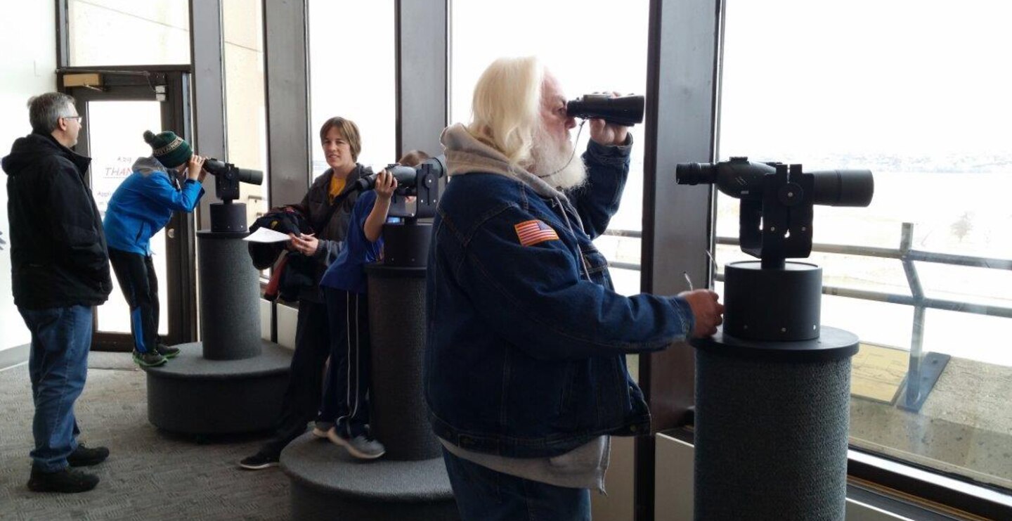 Visitors take part in Eagle watching from the Lewis and Clark Visitor Center, Gavins Point Dam during Bald Eagle Days, January 29-31, 2016. 