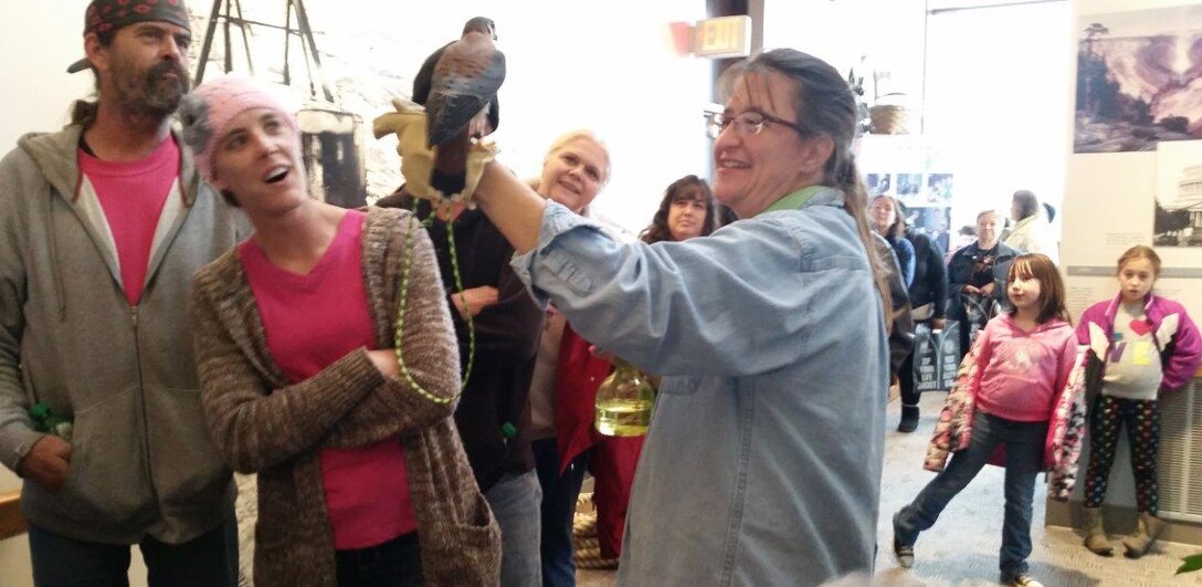 A SOAR representative shows off just one of the raptors during the 2016 Bald Eagle Days at the Lewis and Clark Visitor Center, Gavins Point Dam. 