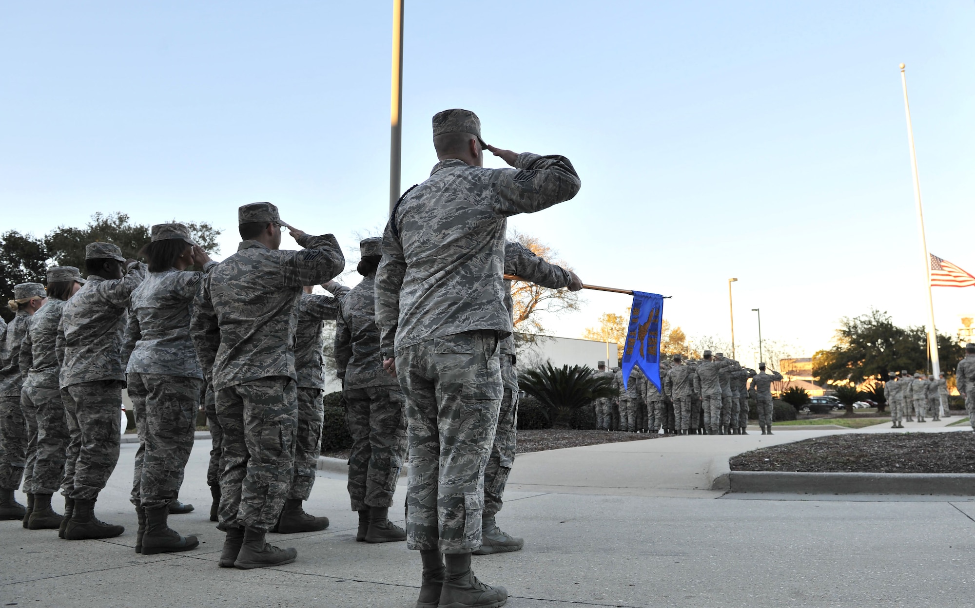 Students assigned to the 81st Training Support Squadron’s military training leader course salute the flag during a retreat ceremony, Feb. 4, 2016, Keesler Air Force Base, Miss. The nine-day course teaches NCOs how to mentor, train and lead Airmen in technical training as MTLs and is the first course held at Keesler since its transition from Joint Base San Antonio-Lackland, Texas. (U.S. Air Force photo by Senior Airman Duncan McElroy)
