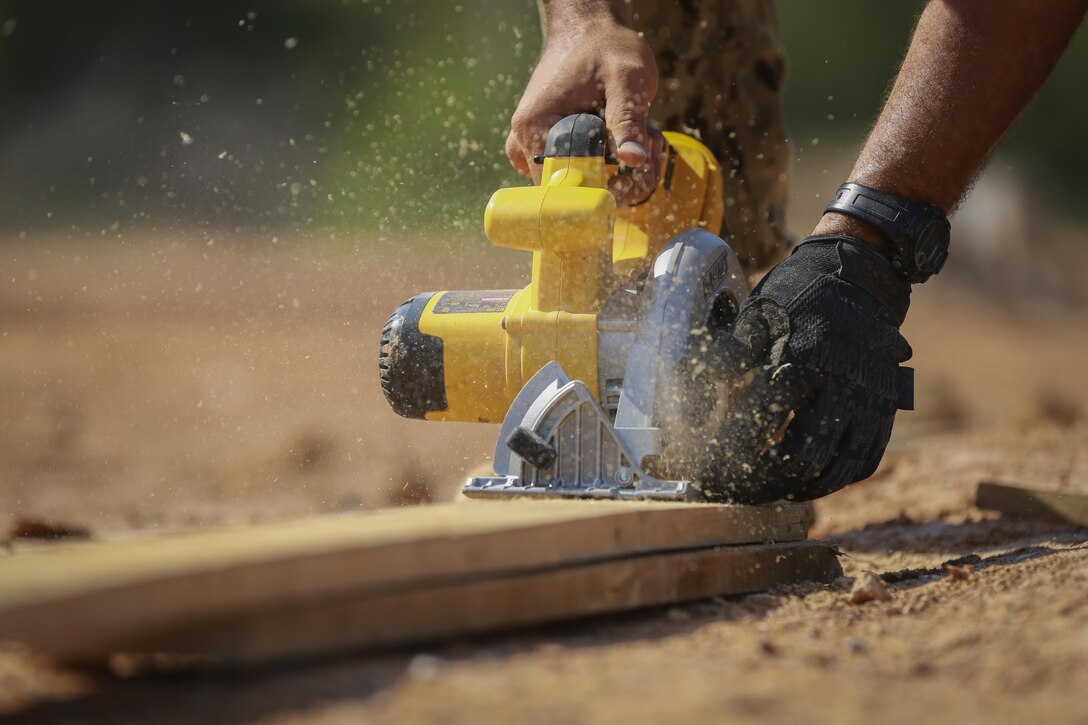 U.S. Navy Petty Officer 1st Class Antonio Gonzalez, builder, with Naval Mobile Construction Battalion 3, helps with the construction of a community center at the Ban Sa Yai School, in Trat, Thailand, during exercise Cobra Gold, Feb. 3, 2016. Cobra Gold 2016, in its 35th iteration, includes a specific focus on humanitarian civic action, community engagement, and medical activities conducted during the exercise to support the needs and humanitarian interests of civilian populations around the region. 