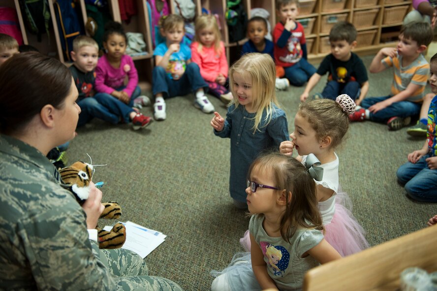 U.S. Air Force Capt. Christianna Moore, 23d Aerospace Medical Squadron general dentist, speaks to children during National Children’s Dental Health Month, Feb. 2, 2016, at Moody Air Force Base, Ga. Moore, along with two fellow dentists and a dental assistant, spoke with approximately 100 kids about dental hygiene. (U.S. Air Force photo by Airman 1st Class Kathleen D. Bryant/Released)
